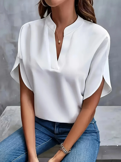Blouse élégante à manches fendues et col en V